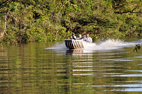 Anglers running one of the endless channels of the Rio Negro searching for peacock bass gold!