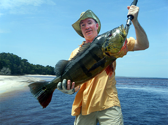 Rick with another big peacock bass he caught while fishing with Tony P!